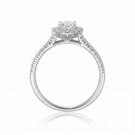 Engagement ring in white gold with a large center diamond in a halo, pavé band, shown from the side