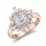 Rose gold ring with a square-cut center diamond surrounded by a halo of round and baguette diamonds on a polished band down to the finger edge.