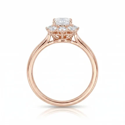 Rose gold engagement ring with a rectangular center diamond and surrounding smaller stones, set high above the band.