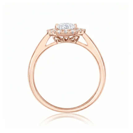Rose gold engagement ring with a large oval center diamond and a diamond halo on a slim band