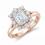 Rose gold engagement ring with a large emerald-cut center diamond surrounded by a halo of round diamonds.