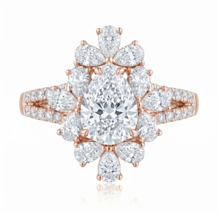 Rose gold ring with a large central pear-cut diamond surrounded by a floral arrangement of marquise-cut diamonds and a pavé diamond band on both sides.