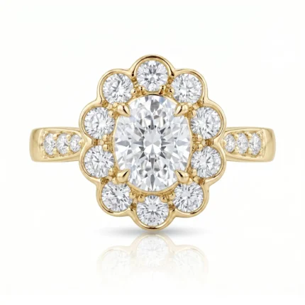 Gold ring featuring a large central diamond framed by a flower-shaped halo of smaller diamonds; the band has diamonds along the sides.