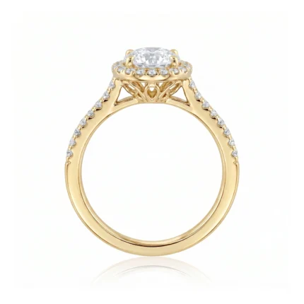 Gold engagement ring with a large central diamond and pavé diamonds along the band, intricate filigree undergallery visible from the side