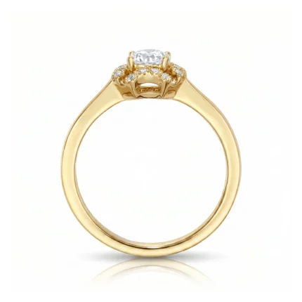 Gold ring featuring a central round diamond with small side diamonds on the setting, shown in profile against a white background, product shot.