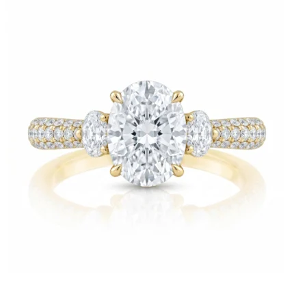 Gold ring with a large oval-cut center diamond and pavé diamond band.