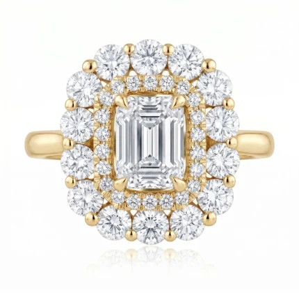 Gold ring with a large emerald-cut center diamond surrounded by two halos of diamonds, prong-set on a polished band