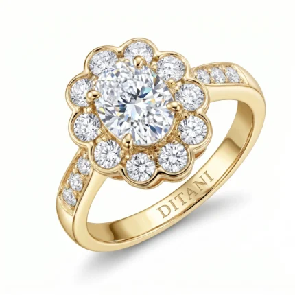 Gold ring with a large central diamond encircled by a flower-shaped halo of smaller diamonds. The band has diamonds along the sides and a engraved interior.