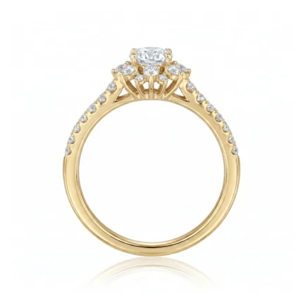 Gold engagement ring with a large central oval diamond in a prong setting, and smaller diamonds along the pavé band on both sides.