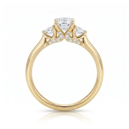 Yellow-gold engagement ring with a large central diamond and pavé-set diamonds along the shoulders, against a white background.