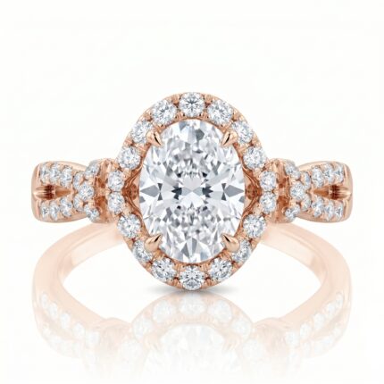 Rose gold ring with a large central diamond and a halo of smaller diamonds around it.