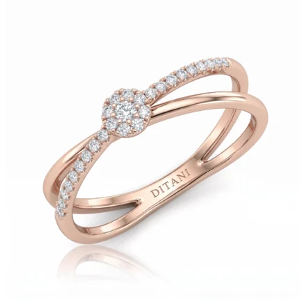 Rose gold ring with a diamond halo and pavé-set diamonds along one split band; inner band engraved with DITANI